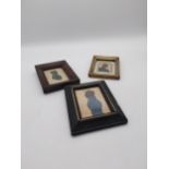 Collection of three 19th C. silhouettes mounted in ebonised frames {Largest 18 cm H x 15 cm W and