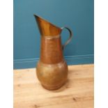 Early 20th C. copper and brass jug {70 cm H x 40 cm W x 34 cm D}.