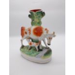 Staffordshire ceramic spill vase in the form of a Cow and calf {28 cm H x 23 cm W x 12 cm D}/