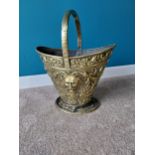 Good quality embossed brass coal scuttle decorated with ivy leaf and masks {48cm H x 29cm W x 40cm