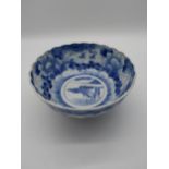 Oriental blue and white ceramic bowl {11 cm H x 24 cm Dia.}.
