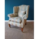 Exceptional quality Duresta Somerset Wingback chair upholstered in Powder Blue Stripe and Gold