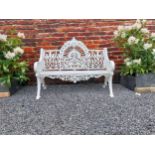 Good quality decorative cast iron garden bench in the Pierce of Wexford style {110 cm H x 132 cm W x