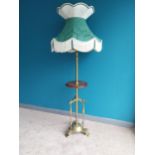 Edwardian brass and mahogany standard lamp with cloth shade {160 cm H x 58 cm Dia.}.