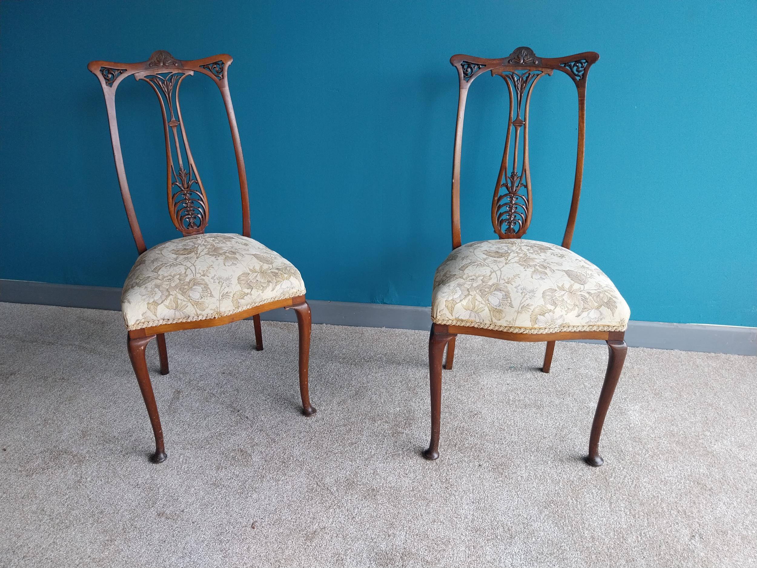 Pair of Edwardian mahogany side chairs with upholstered seat raised on cabriole legs {93 cm H x 44