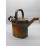 19th C. brass watering can {38 cm H x 44 cm W x 18 cm D}.