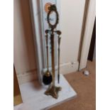 Unusual pair of 19th C. brass stands with irons {70 cm H x 14 cm W x 14 cm D}.