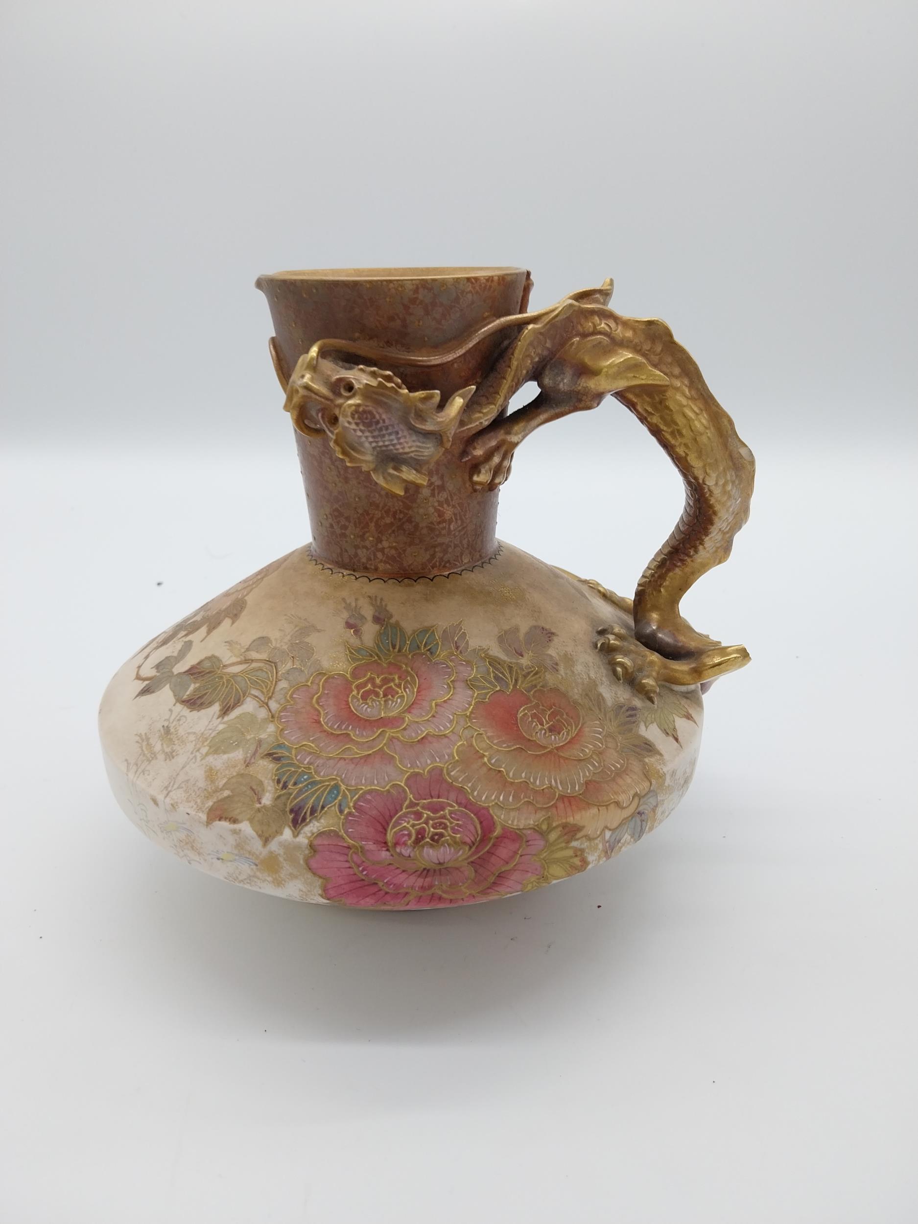 19th C. hand painted ceramic jug decorated with a dragon in the Oriental style {19 cm H x 20 cm