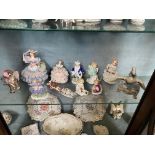 Collection of twelve ceramic Dresden figurines.