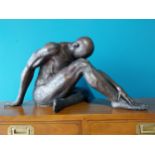 Exceptional quality contemporary bronze sculpture of a male acrobat {33cm H x 67cm W x 36cm D}