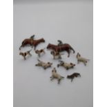 Early 20th C. of die cast spelter seven hunting hounds, one fox and two horse and Jockeys {Horses