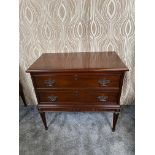 Mahogany side cabinet with two long drawers raised on turned legs {82 cm H x 87 cm W x 46 cm D}.