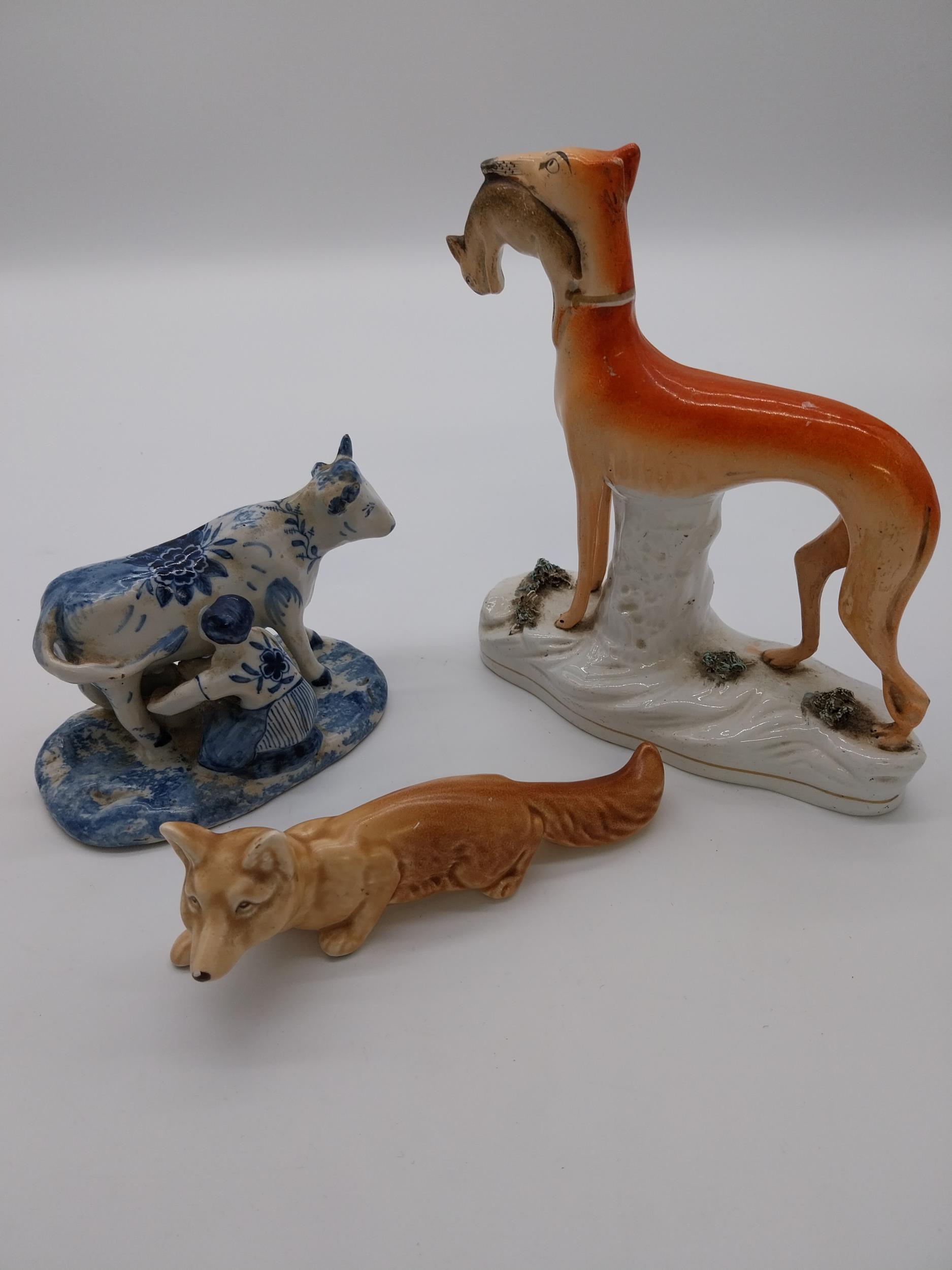 Staffordshire figure of Greyhound {20 cm H x 18 cm W}, Dutch blue and white cow and milk maid and - Image 2 of 6