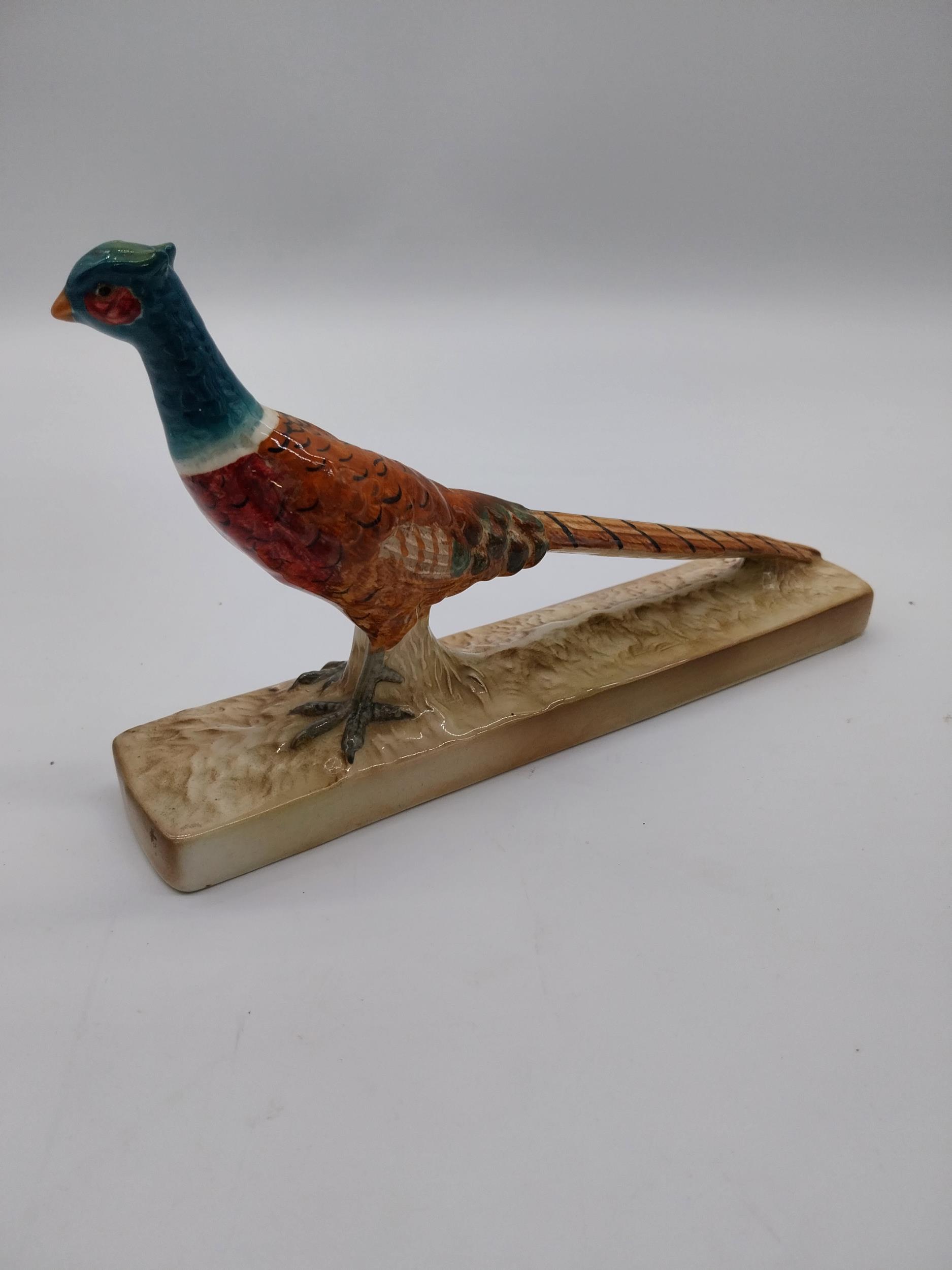 Beswick hand painted ceramic model of a Pheasant {14 cm H x 22 cm W}. - Image 2 of 2