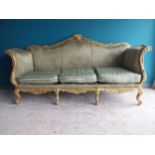 Decorative hand carved giltwood and upholstered three seater sofa in the French style {116 cm H x