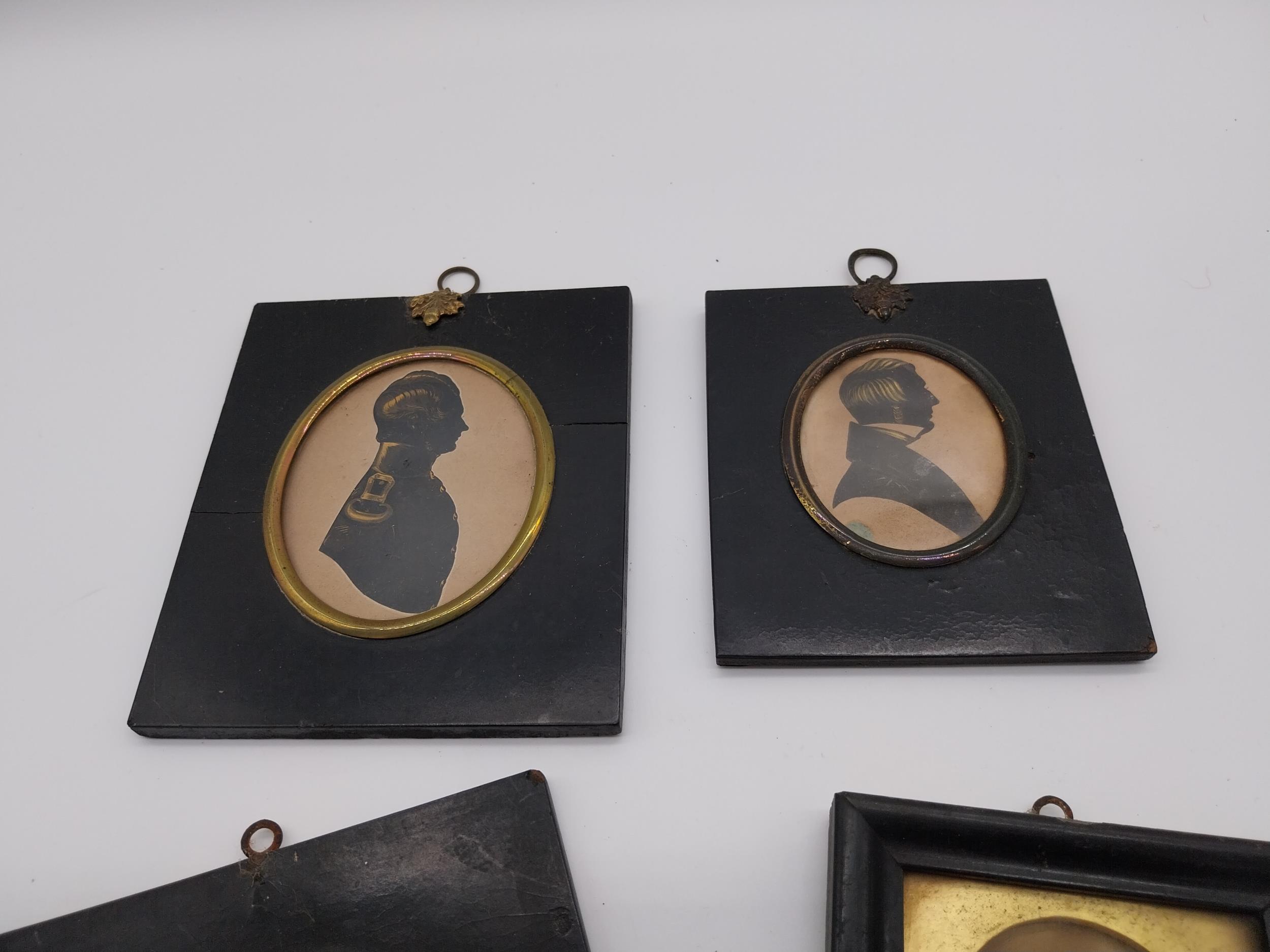 Collection of four 19th C. silhouettes mounted in ebonised frames {Largest 15 cm H x 13 cm W and - Image 2 of 3