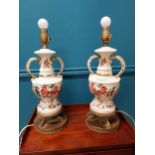 Pair of decorative hand painted ceramic table lamps raised on brush brass bases {52 cm H x 18 cm