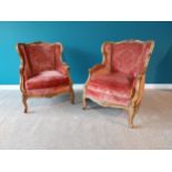 Good quality pair of His and Hers French Edwardian carved walnut and upholstered armchairs raised on