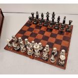 Chrome and leather chess set in leather case {7cm H x 33cm W x 33cm D}