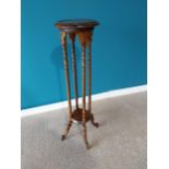Mahogany jardinière stand raised on barley twist columns and four outswept legs {102 cm H x 30 cm