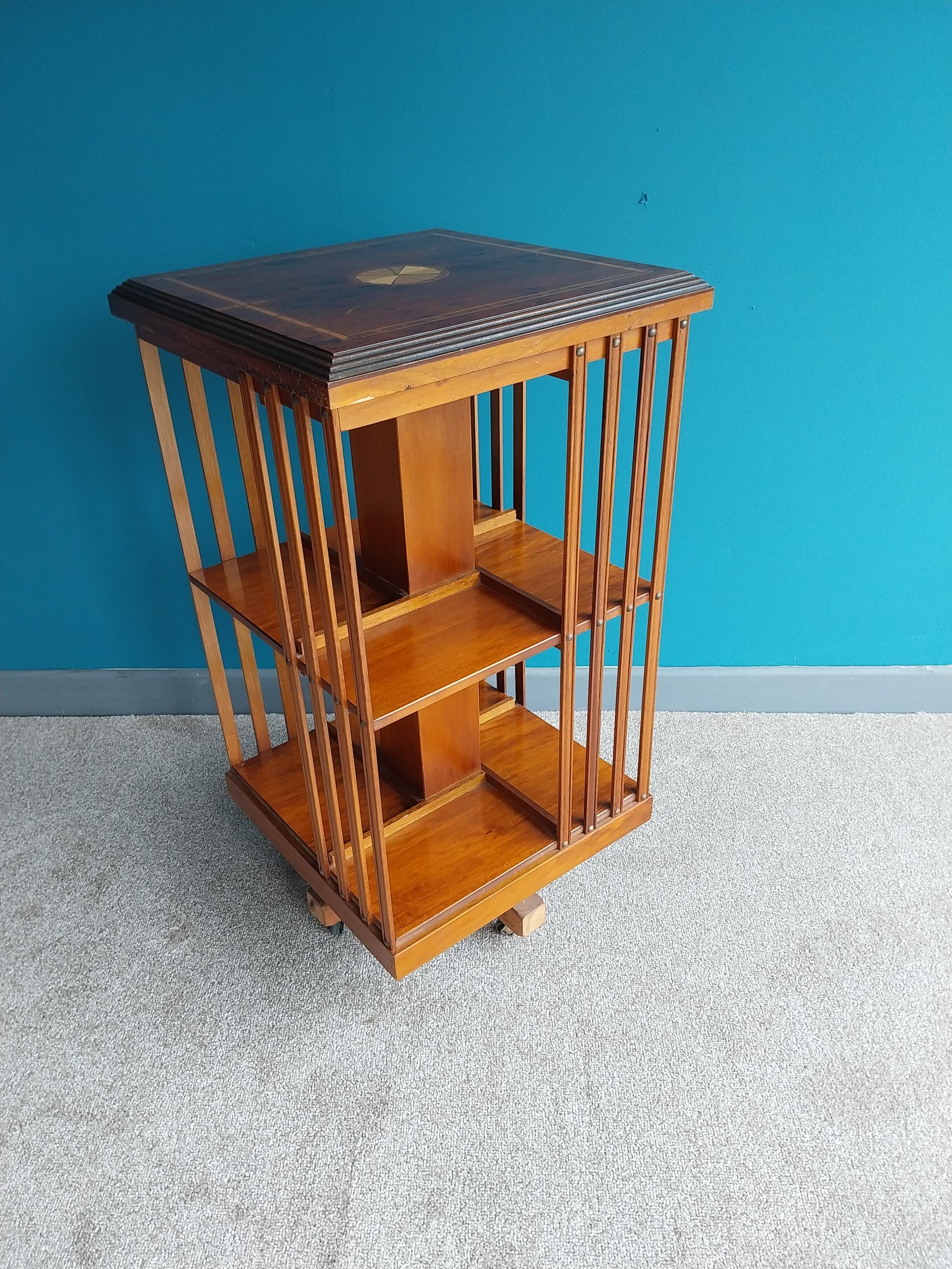 Good quality 1950s yew wood and satinwood inlaid revolving bookcase in the 19th C. style {84 cm H