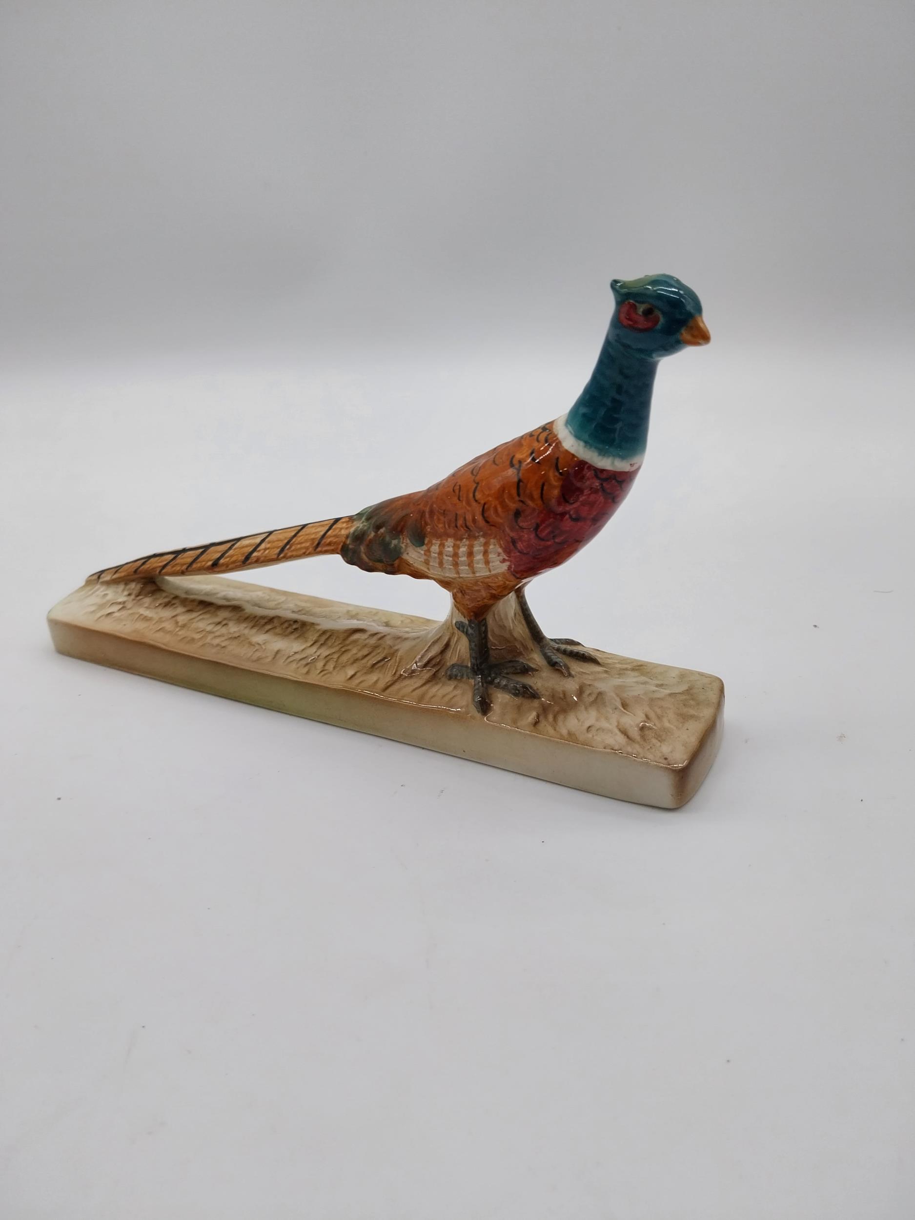 Beswick hand painted ceramic model of a Pheasant {14 cm H x 22 cm W}.