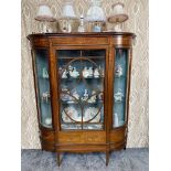 Good quality mahogany and satinwood inlaid bow fronted display cabinet raised on square tapered legs