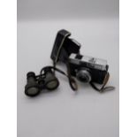 Pair of early 20th C. binoculars and 1970's Kodak camera in case.