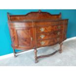 Edwardian walnut bow fronted sideboard with gallery back and three long drawers flanked by two blind