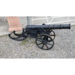 Pair of good quality cast iron Cannons in the Georgian style {70 cm H x 156 cm W x 38 cm D}.