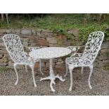 Aluminium garden table with decorative cast iron base and two cast aluminium armchairs {Table H 63cm