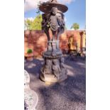 Large decorative French moulded stone urn decorated with Cherubs mounted on plinth {240 cm H x 110