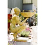 Exceptional quality bronze water feature in the form of an Art Deco lady raised on cut limestone