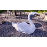 Good quality painted aluminium model of a Swan {65 cm H x 94 cm W x 38 cm D}.