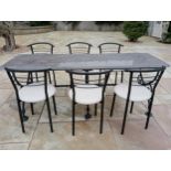 Cast iron table with marble top and six metal chairs with leather upholstered seats {Table H 71cm