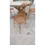 Set of four early 20th C. wrought iron garden chairs {90 cm H x 40 cm W x 40 cm D}.