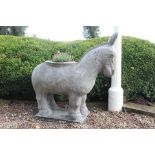 Carved stone planter in the form of a foal {H 110cmx W 42cm x D 110cm }