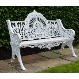 Cast iron arched back garden seat in the Pierce of Wexford style {100 cm H x 120 cm W}.