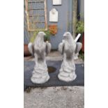 Pair of moulded stone pillar top Eagles {60 cm H x 27 cm W x 30 cm D}.