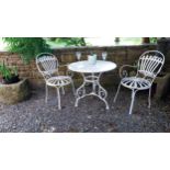 Exceptional quality hand forged wrought iron Arras style circular garden table and two matching