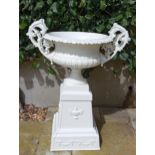 19th C. cast iron urn and base {H 108cm x W 85cm x D 60cm}