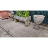 Pair of moulded stone urns with spiral design {65 cm H x 46 cm Dia}.