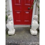 Pair of stone models of guard Dogs with lead collars {H 77cm x W 26cm x D 26cm}