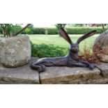 Exceptional quality bronze sculpture of a Hare {36 cm H x 62 cm W x 30 cm D}.