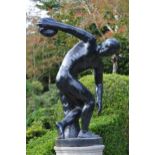 Cast iron sculpture of The disc thrower on circular plinth {95 cm H x 62 cm W}.