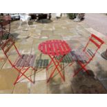 Red folding metal and wooden bistro table with two chairs {Table H 71cm x Dia 60cm - Chair H82cm x W