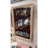 Pure Wholesome Bread wood effect reverse painted glass framed advertising sign {88 cm H x 56 cm W}.