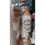 Two 19th C. stoneware ginger beer bottles - Thomas Mulhern Letterkenny. {20 cm H x 7cm Dia.}.