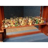 Collection of fourty five miniature liquor bottles {}.