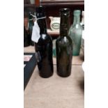 Two 19th C. bottles - William Cahill Baggot Street and J Donohoe Enniscorthy. {23 cm H}.